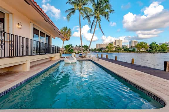Waterfront 7-BR Estate w/ 300 ft Waterfront, Private Pool & Sleeps 16